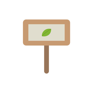 Wooden garden label with green leaf. Spring garden design element.