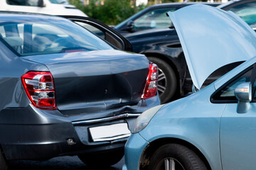 Car accident in parking lot during day with damaged vehicles © Oleksandr