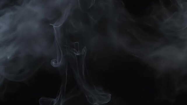 Wispy, ethereal white smoke billows and swirls against a deep black background