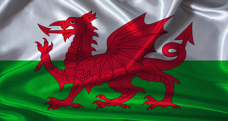 National flag of Wales with cloth texture. Wales flag with realistic texture background © IHERPHOTO