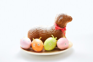 Easter lamb cake with colorful decorative eggs