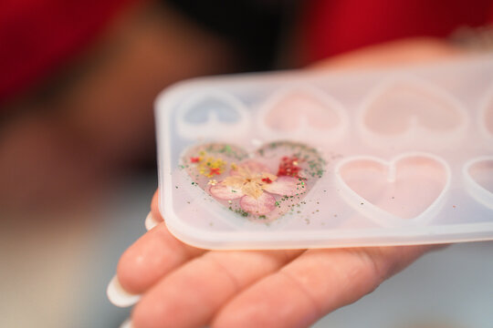 A master class on making jewelry from epoxy resin. Close-up