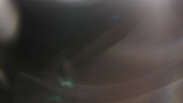 Real lens flare overlay or background from lens with glass elements in front of it