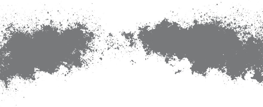 Two large grey ink splatter shapes on a white background