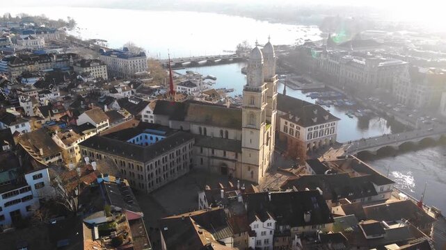 Grossm&uuml;nster historic church with twin towers Zurich, Switzerland aerial drone Swiss city