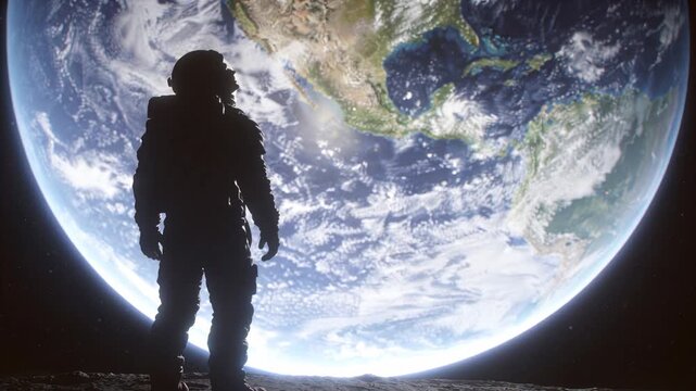 Adult astronaut wearing helmet and backpack on rocky regolith, gazing upward at illuminated planet