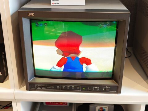 Russia, St. Petersburg, March 14, 2026 -Mario plays a video game on a small JVC TV in a gaming store display