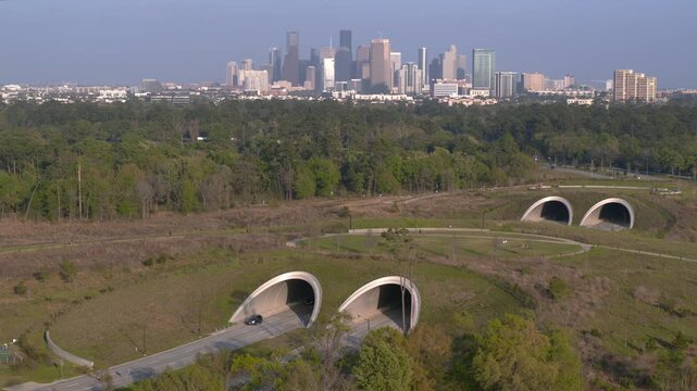 High angle drone view of Houston Memorial City park and downtown Houston 