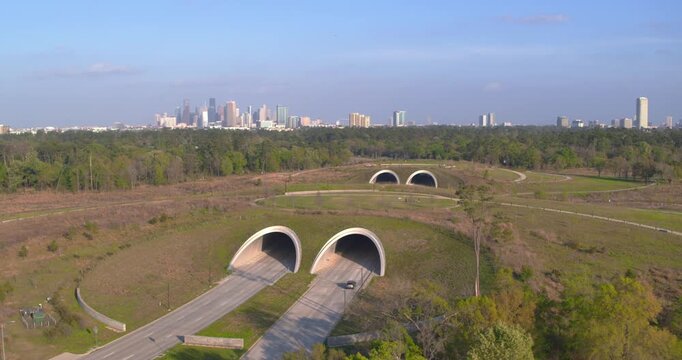 High angle aerial of Memorial City Park with surrounding green space and downtown Houston, Texas 