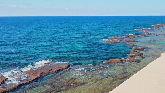 Akko old city coastline with clear mediterranean sea