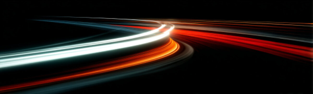 Red and cya neon waves sweep forward along highways. Glowing trails create sense of motion. Futuristic energy radiates vividly.
