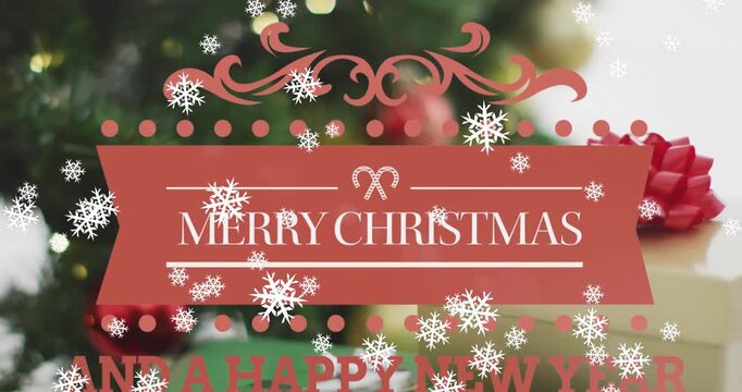 Animation of snow falling over christmas greetings text and decoration