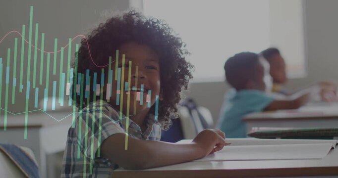 Front boy smiling, moving pencil, studying workbook in class while bars overlaying face from left