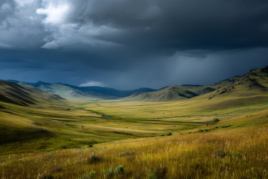 A vast green valley surrounded by rolling hills under a dark and stormy sky with heavy clouds
