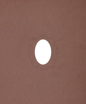 Decorative Frame Cutout on Brown Paper Background