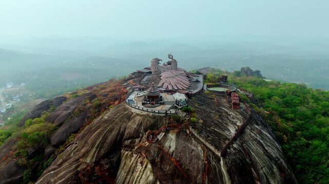 Areal shots of Jatayu Para in Kerala, India, featuring the world&rsquo;s largest bird sculpture set atop a rocky hill. The video highlights dramatic rock formations, panoramic views