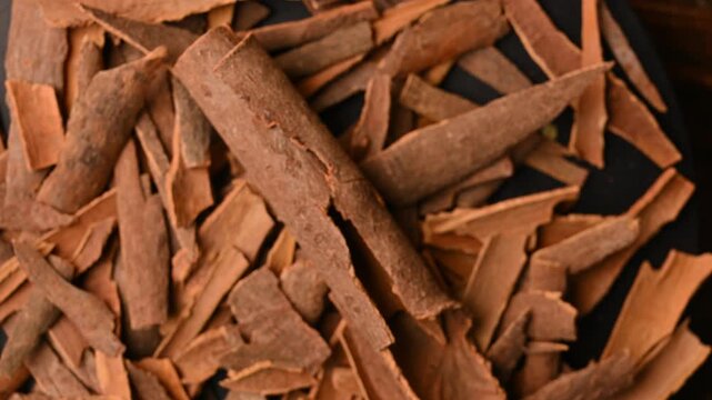 Rotating Top View of Dalchini (Cinnamon Sticks) &ndash; Aromatic Spice Footage