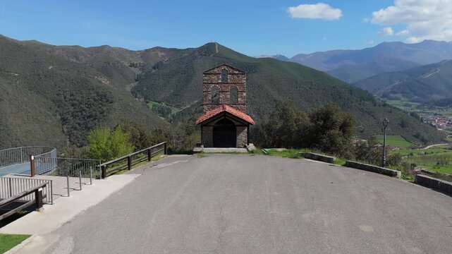 Aerial drone view of San Miguel in Potes Cantabria Spain hermitage and viewpoint near Santo Toribio with Picos de Europa on a sunny day