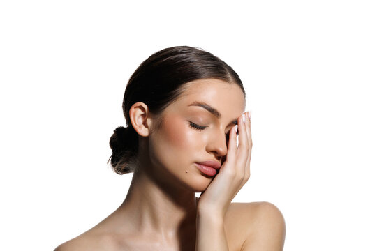 Portrait of beautiful woman after spa treatment on white background