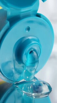 Close up of dispensing beauty cream from packaging, skincare product for healthy skin with smooth texture.