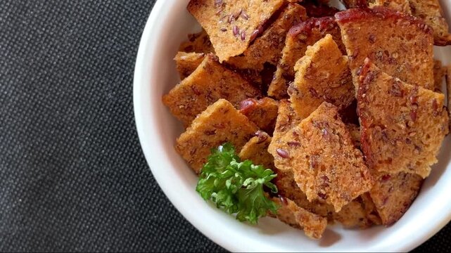 Crouton spices flax seeds croutons crisps rye bread chips tasty snack fresh gourmet food background on the table rustic food top view copy space