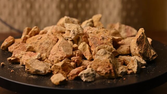Side View of Multani Mitti (Fuller&rsquo;s Earth) Rotating on Black Background &ndash; Beauty And Skincare Rotating Footage