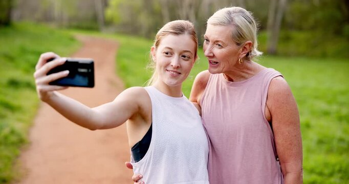 Mature mom, daughter and fitness on selfie with happiness for social media, post and profile picture in Canada. People, family and smile in park or forest on morning walk, run and exercise breast
