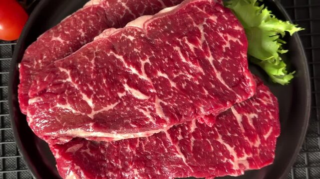 Raw beef steak marbled meat veal tasty snack fresh delicious gourmet food background on the table rustic food top view copy space