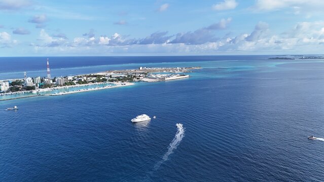 Aerial View of Maafushi Island Maldives Tropical Beach Resort and Turquoise Lagoon