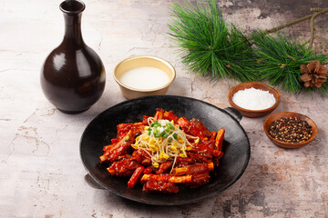 돼지고기의 갈비의 등 쪽에 붙어 있는 부분. 또는 등에 붙은 갈비. The part of pork ribs attached to the back. Or ribs attached to the back.   © jinho Park