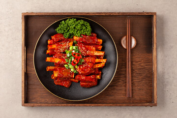 돼지고기의 갈비의 등 쪽에 붙어 있는 부분. 또는 등에 붙은 갈비. The part of pork ribs attached to the back. Or ribs attached to the back.   © jinho Park