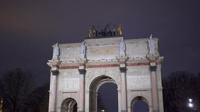 Arc de Triomphe du Carrousel in Paris France at night