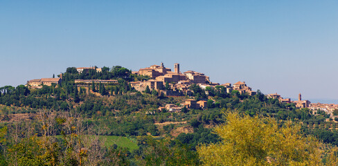 Naklejka premium Panoramic distant view of the medieval hilltop town of Montepulciano in Tuscany, Italy.