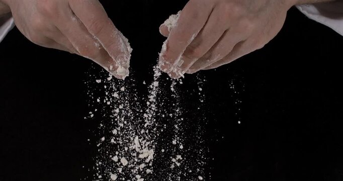 Super slow motion, Caucasian Baker Sifting Flour, Tactile Closeup