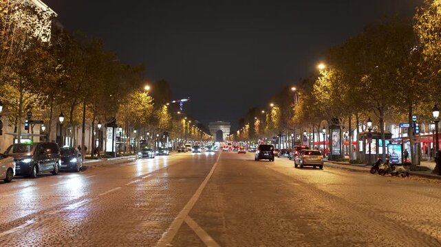 Champs-&Eacute;lys&eacute;es in Paris France at night with Arc de Triomphe