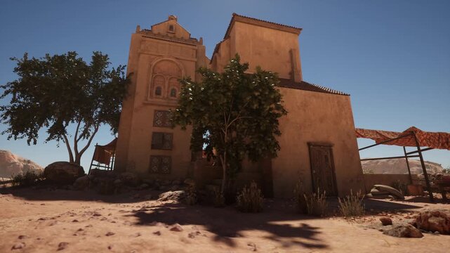 Low sun adobe house with dramatic shadows, film crew scouting location around textured walls and trees, cinematic compositions with long shade and warm tones,