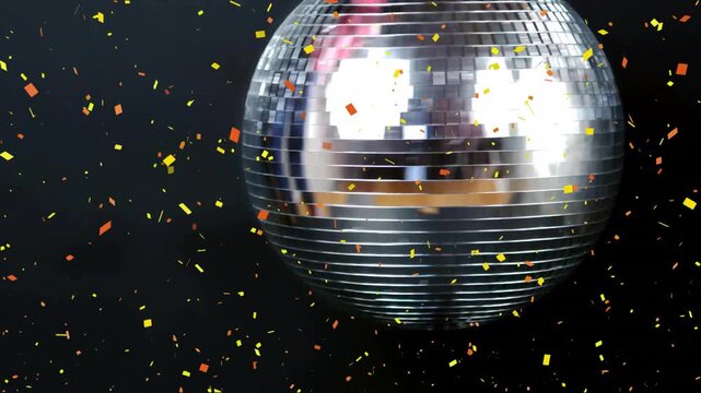 Animation of confetti falling over mirror disco ball on black background