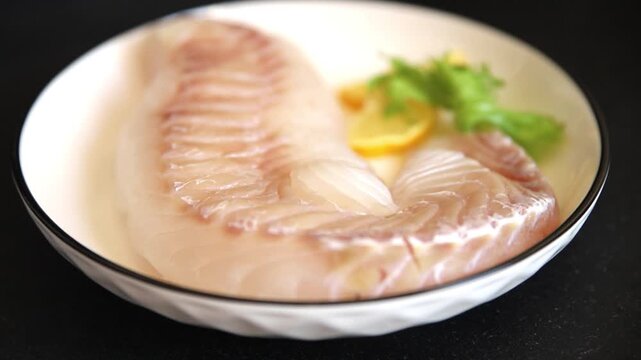 Cod fish fillet, raw fish seafood tasty snack fresh pescetarian diet gourmet food background on the table pescetarian diet rustic food top view copy space keto and paleo diets 