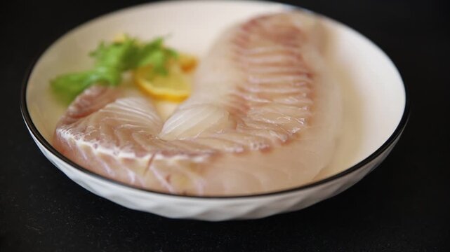 Cod fish fillet, raw fish seafood tasty snack fresh pescetarian diet gourmet food background on the table pescetarian diet rustic food top view copy space keto and paleo diets 