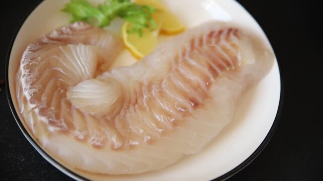 Cod fish fillet, raw fish seafood tasty snack fresh pescetarian diet gourmet food background on the table pescetarian diet rustic food top view copy space keto and paleo diets 