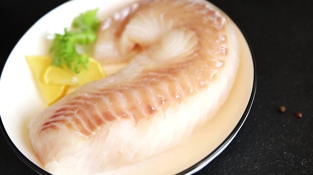 Cod fish fillet, raw fish seafood tasty snack fresh pescetarian diet gourmet food background on the table pescetarian diet rustic food top view copy space keto and paleo diets 