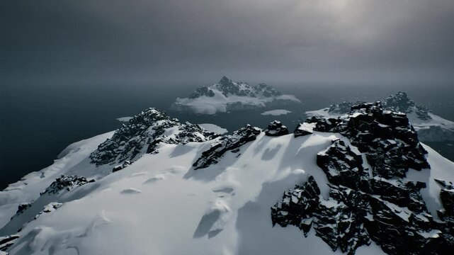 wind carved snow slope under heavy clouds overlooking choppy sea, sharp shadows define rock formations and drifts, mood of tension and elemental force, useful