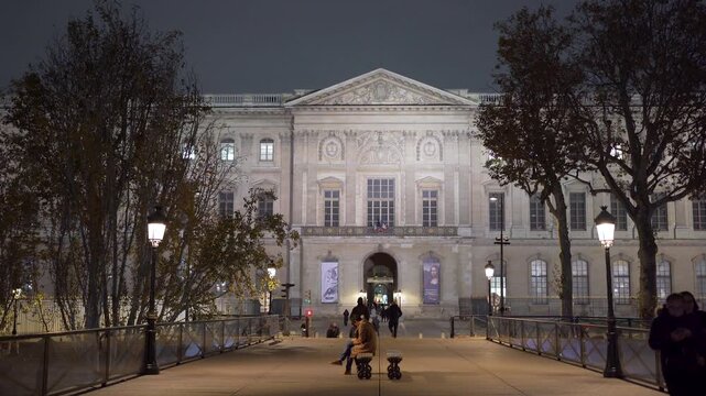Porte Des Arts seen from Pont des Arts in Paris France at night