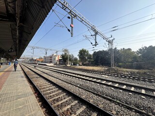Fototapeta premium People waiting for trains on railway station