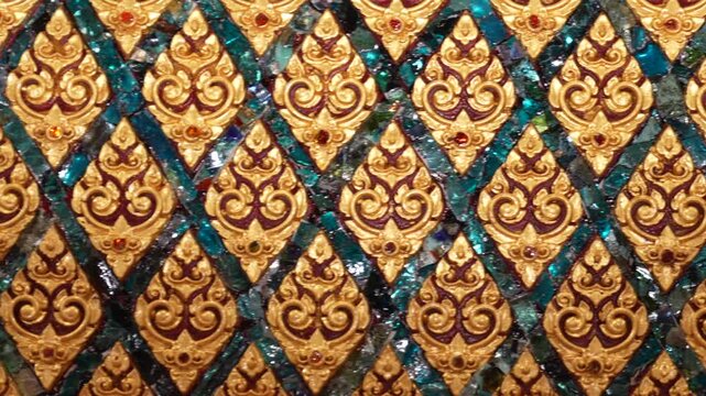 Elegant Thai decorative pattern with glass mosaic details producing a luxurious surface suitable for premium design and cultural backgrounds.