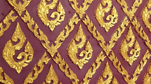 Traditional Thai golden pattern on red background with intricate ornamental design. Suitable for luxury decoration, cultural branding, and premium background usage.