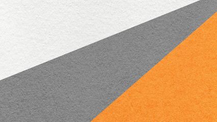 Fototapeta premium Abstract geometric paper texture background with white, gray, orange diagonal split. Rays pattern decorative backdrop