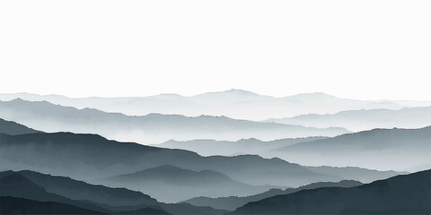 A serene misty mountain landscape at dawn features a silhouette of forest trees over a blue valley as clouds and fog drift across the peak during a winter sunrise. © ATIA