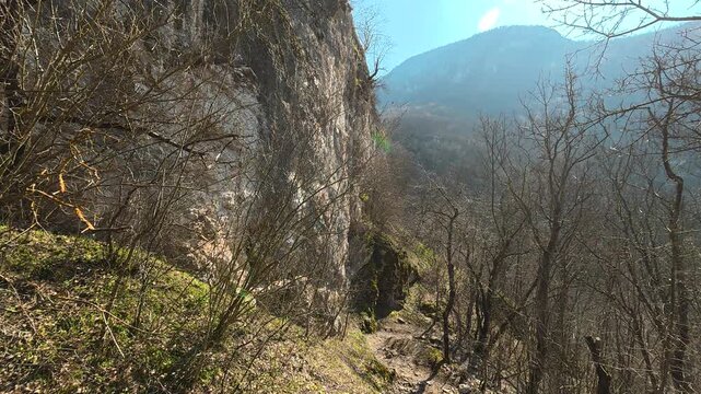 Low Angle View of Large Rock and Mountain Peak in Autumn Forest. Ozren Mountain, Soko Grad. Balkans, Serbia.