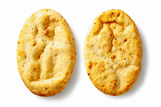 Two oval indian naan kulcha flatbreads top view